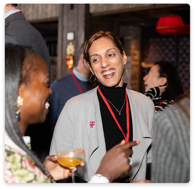Guests networking at the evening event
